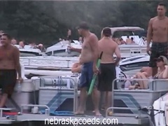 Home video of a coed party at cove lake on spring break